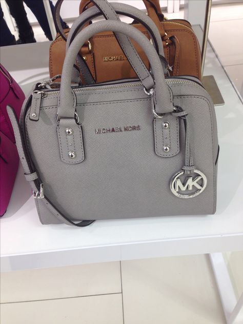 американский бренд сумок Michael Kors
